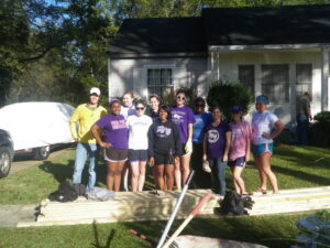 Karpovich and a group of students during the fall alternative spring break trip to Tuscaloosa, Ala.