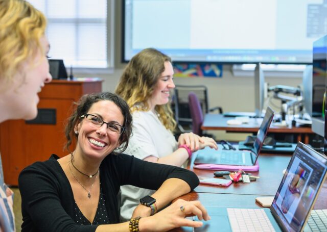 Graphic design student creating visual work in the Design Studies program at HPU's Hayworth School of Arts and Design