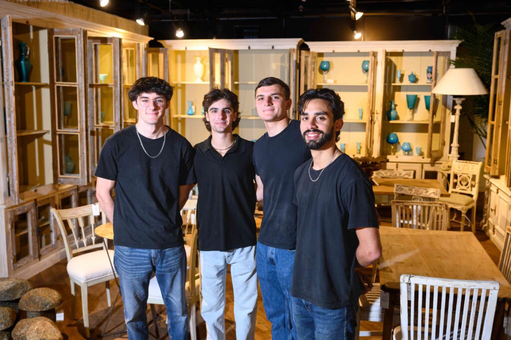 hpu students in showroom at hp furniutre market