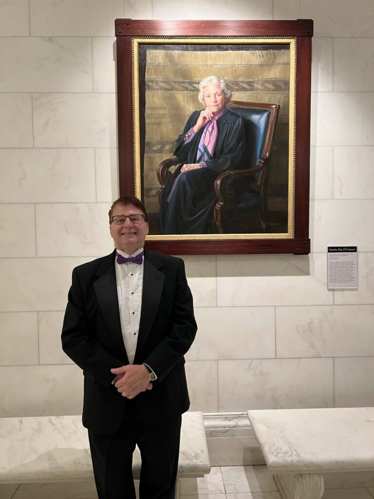Mark Martin with portrait of Sandra Day O Connor