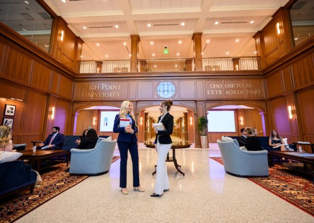 Law students gathered in the lobby of the High Point University’s Kenneth F. Kahn School of Law