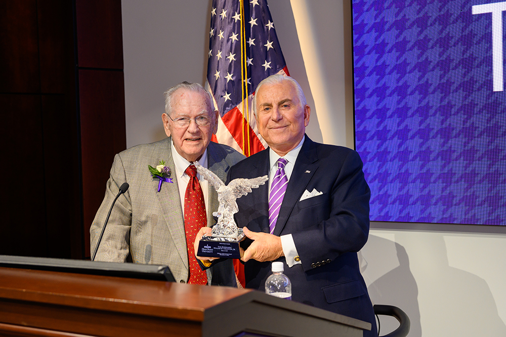 BIll Goldston received an award presented to him by HPU President Nido Qubein.