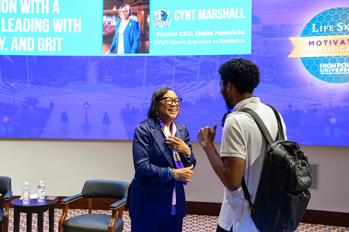 Marshall smiled as she met with an HPU student after her talk in the Callicutt Life Skills Theater.