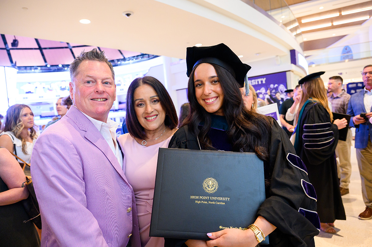 Dr. Gianna Gravius enrolled in a residency program at the University of North Carolina at Chapel Hill after graduating from HPU with a DPT degree in 2025. She posed with her parents, Daniel and Diann Gravius, following her graduation.