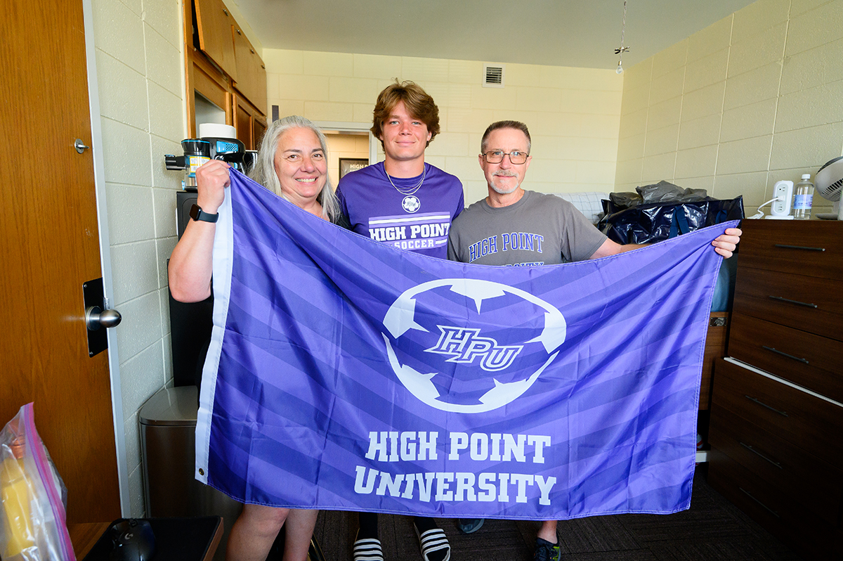 Cristina and Rick Lappin moved their son, Matthew, center, into his dorm room in Finch Hall. Matthew is their third child to attend HPU, joining his older sister, Angelina, and his older brother, Mark, on campus.