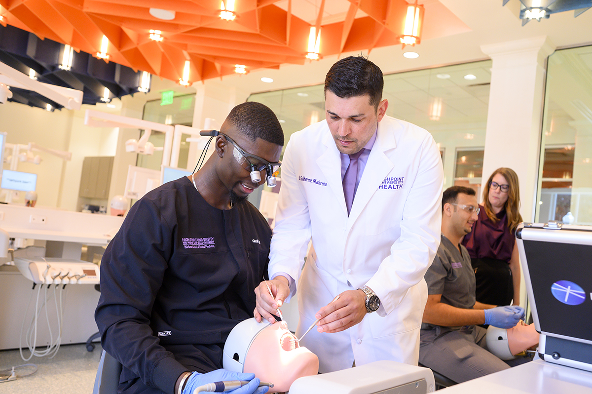 HPU was ranked this year in a new category for Best Classroom Experience. Dr. Guilherme Madureira, a clinical assistant professor in the Workman School of Dental Medicine, worked with a dental student in a state-of-the-art classroom.