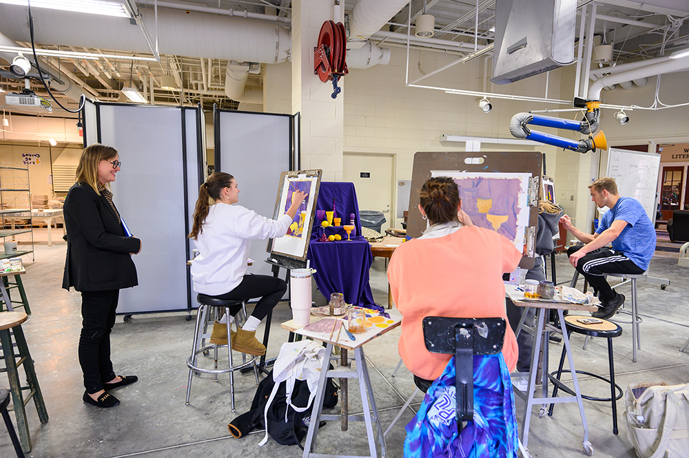 Monique Rollins met with High Point University art students during her first visit to campus as HPU’s Artist in Residence on Oct. 17. While on campus, she watched as students worked on their own paintings inside an art studio in Plato S. Wilson Hall.