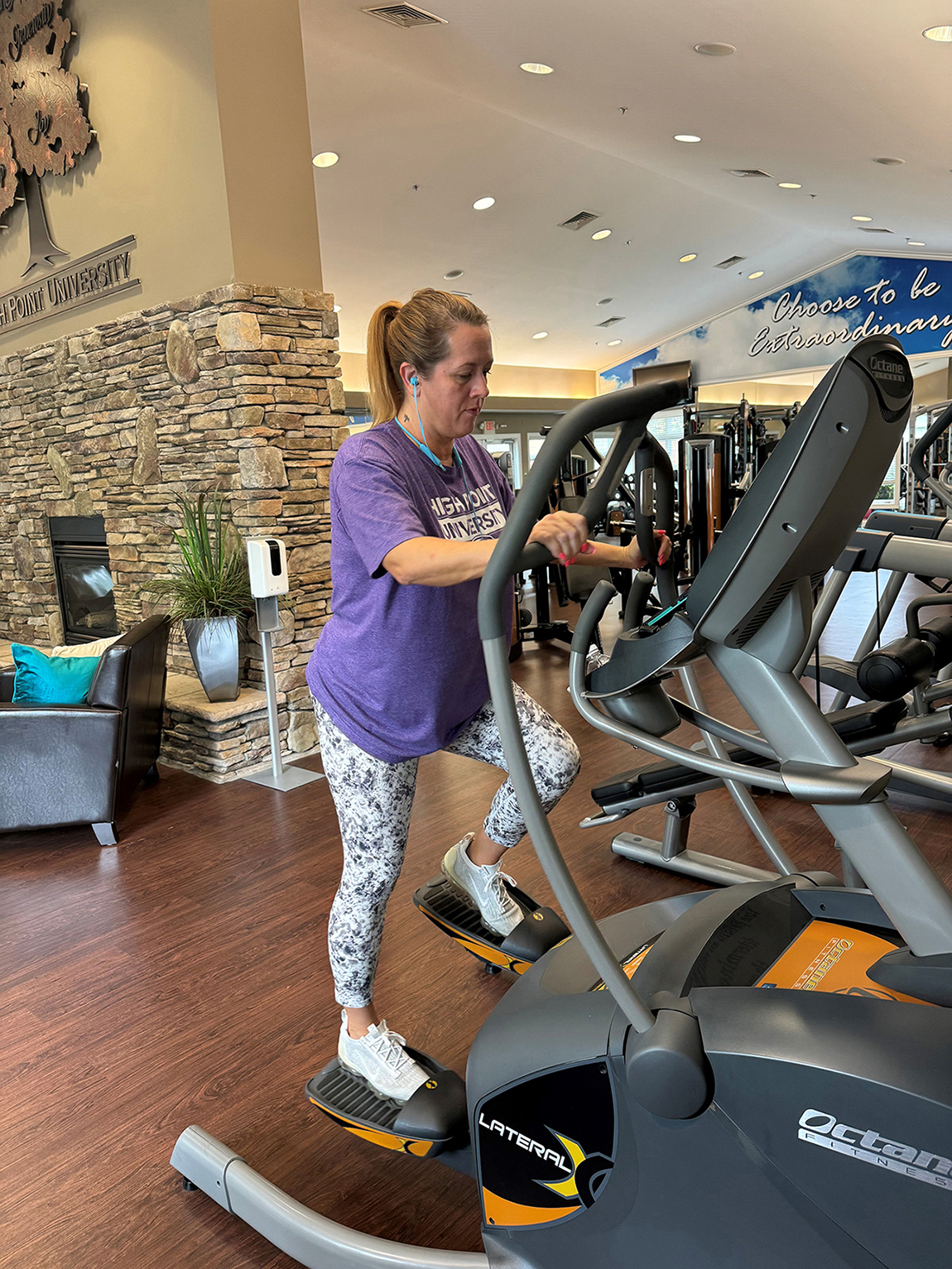 Pictured is Candice Phipps, assistant director of the University Mail Center, doing a cardio workout on the lateral step trainer in the Employee Wellness Center. 