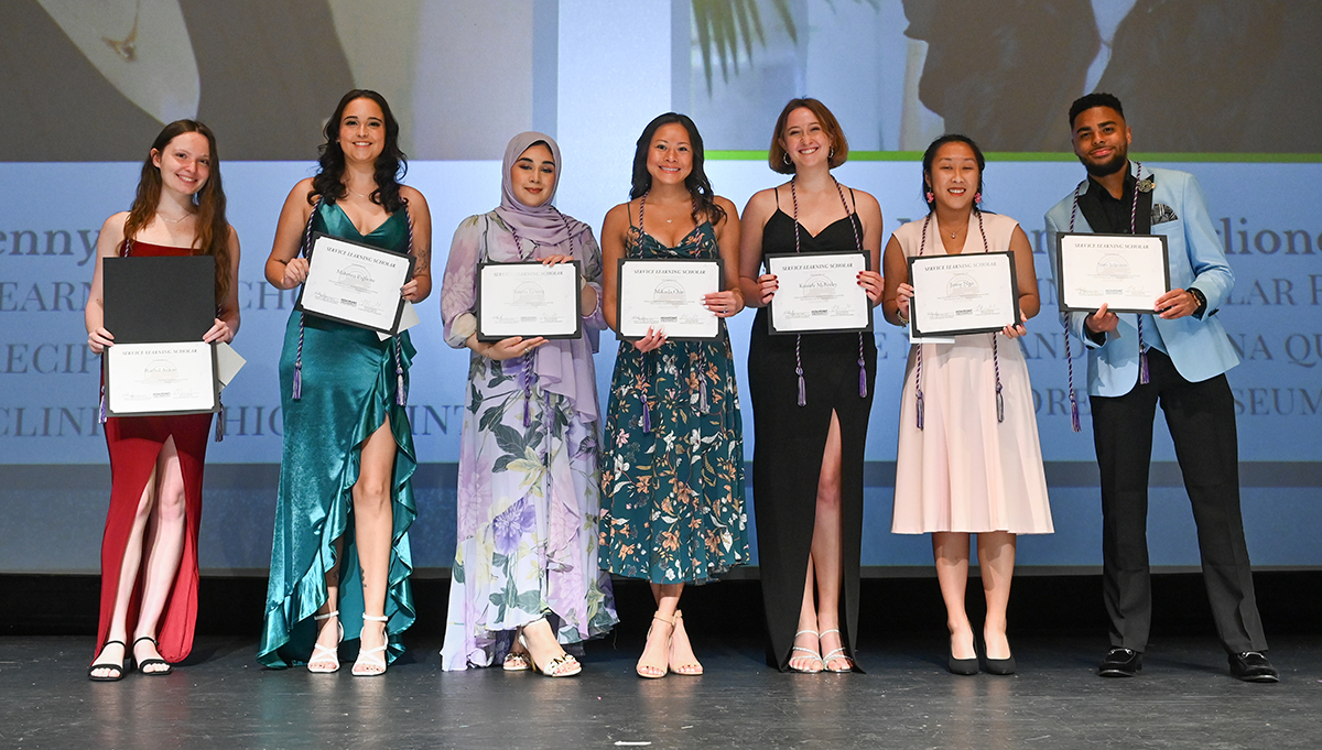 Pictured from left are Service-Learning Scholars Rachel Anton, Makenna Paglione, Sawera Farooq, Mikaela Chin, Kassidy McFeeley, Jenny Ngo and Sam Johnson.