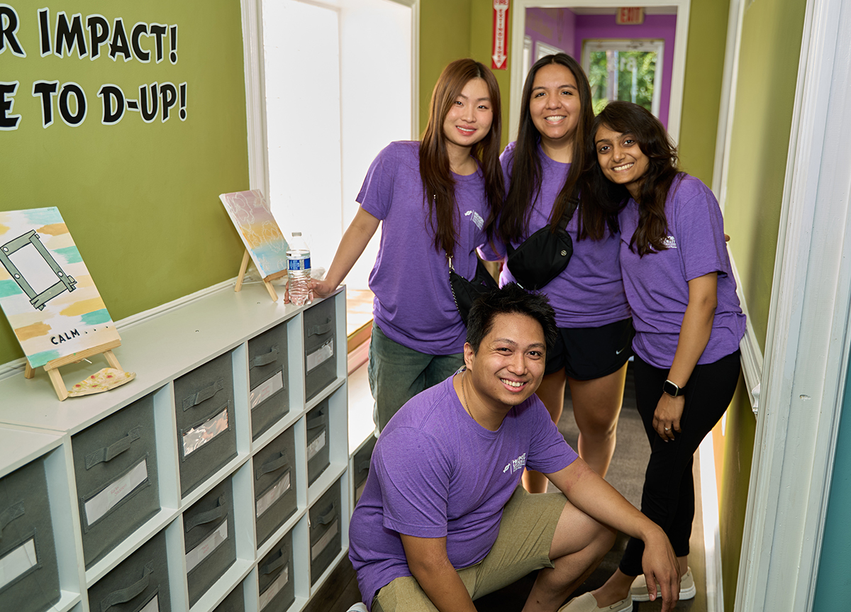 MJ Sta. Ana, front, worked at D-Up along fellow HPU pharmacy students Ngan Vo, Barbara Gonzalez Lara and Tulsi Patel, shown from left behind him.