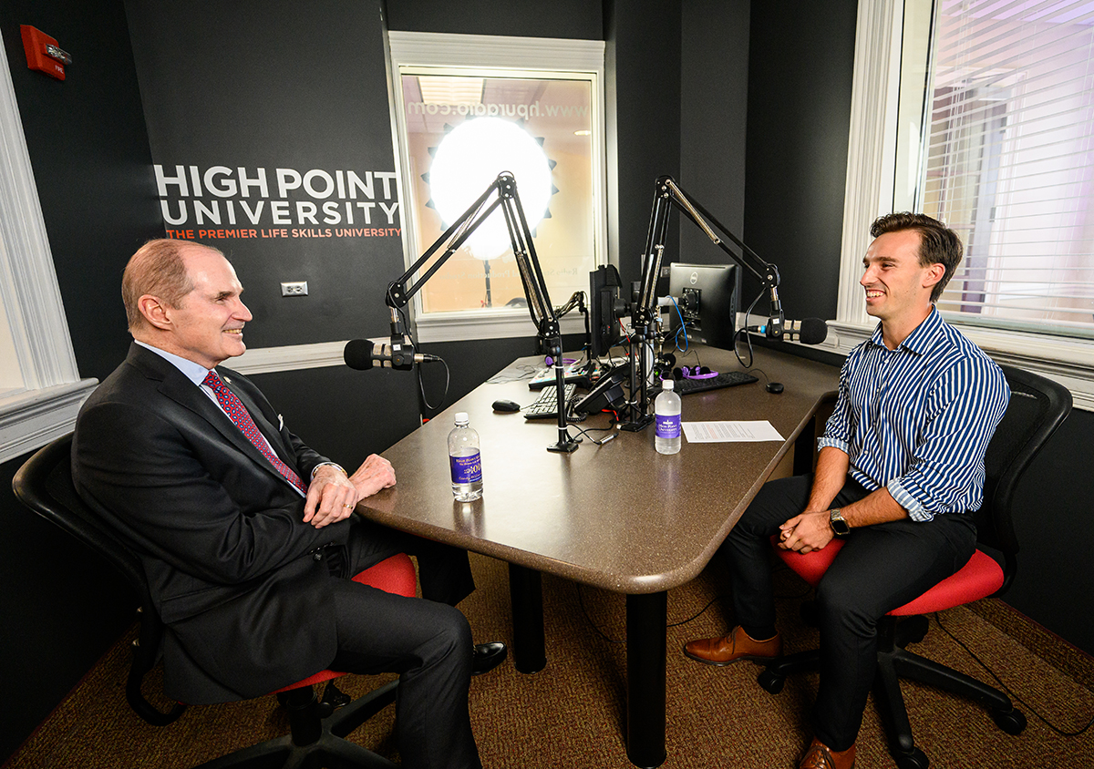 McCollough smiled with HPU student Graham Wesel while recording a podcast.