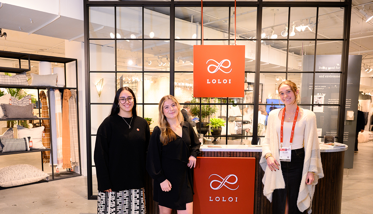 Pictured from left in the Loloi Rugs showroom are Morgan Franzoni, a sophomore graphic design major from Cumberland, Rhode Island; Danielle Pellegrino, a senior social media and digital communications major from Wayne, New Jersey; and Amy Loving, a sophomore business administration major from Philadelphia, Pennsylvania. 