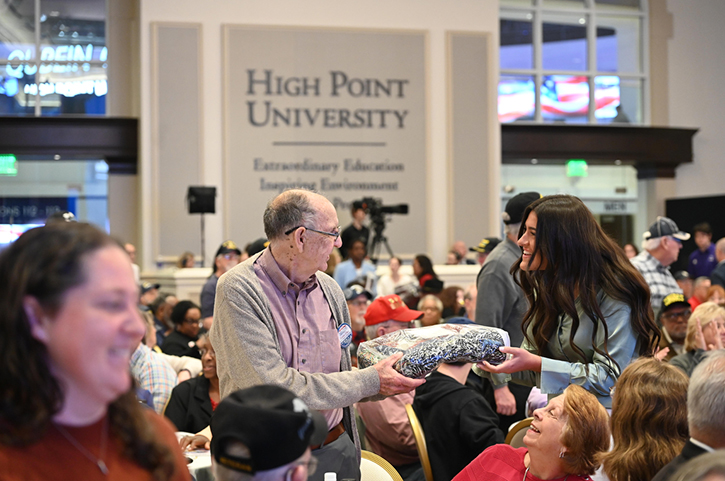 Student volunteers shared blankets with veterans to show appreciation for their service at last year’s event.