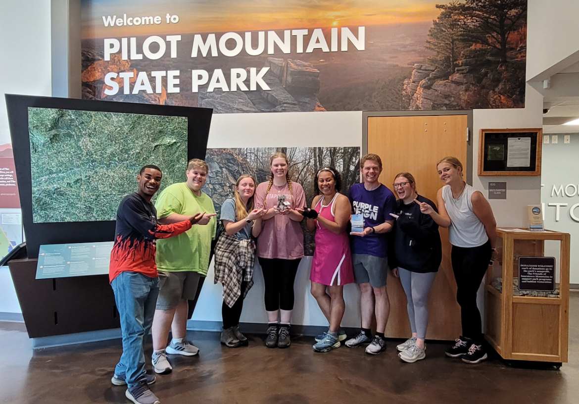 Pictured from left at Pilot Mountain are Benjamin Carver, Meigs Roberts, Cassidy Brake, Riley Rickman, Rev. Andria Williamson, Bradley Taylor, Haley Hedrick and Emma Higgins.