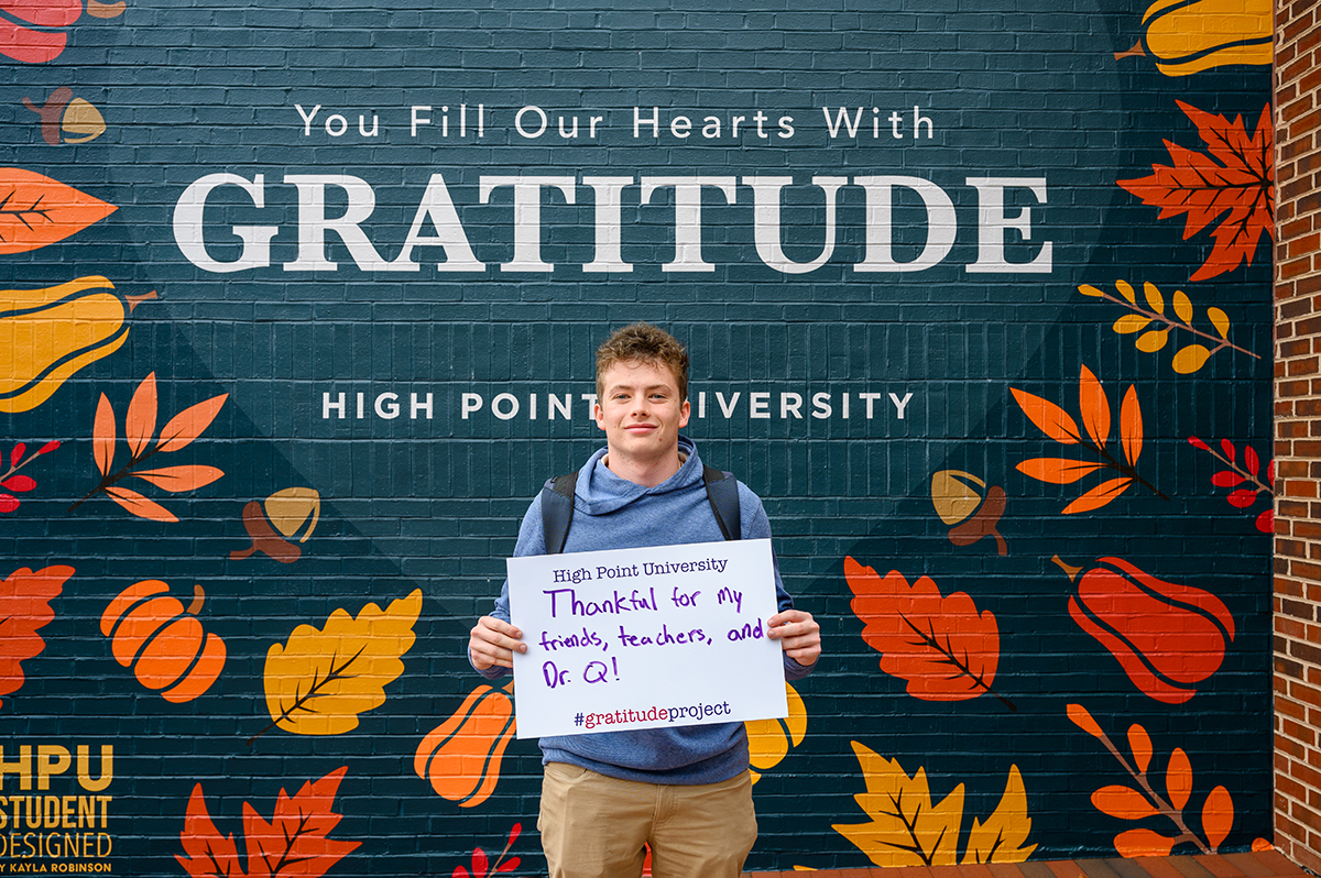 Finn McGeough, a sophomore entrepreneurship major from Manhattan, New York, showed his gratitude for friends, family and HPU President Nido Qubein.