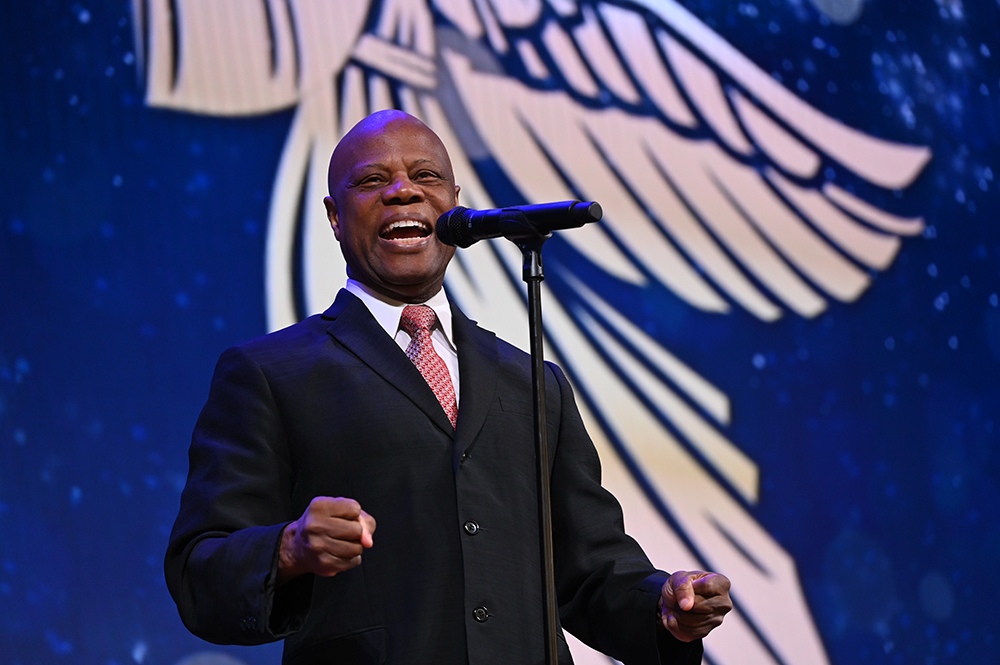 Wintley Phipps, a pastor and world-renowned vocal artist, received standing ovations from the audience after he performed several holiday-themed songs during the Christmas Prayer Breakfast.