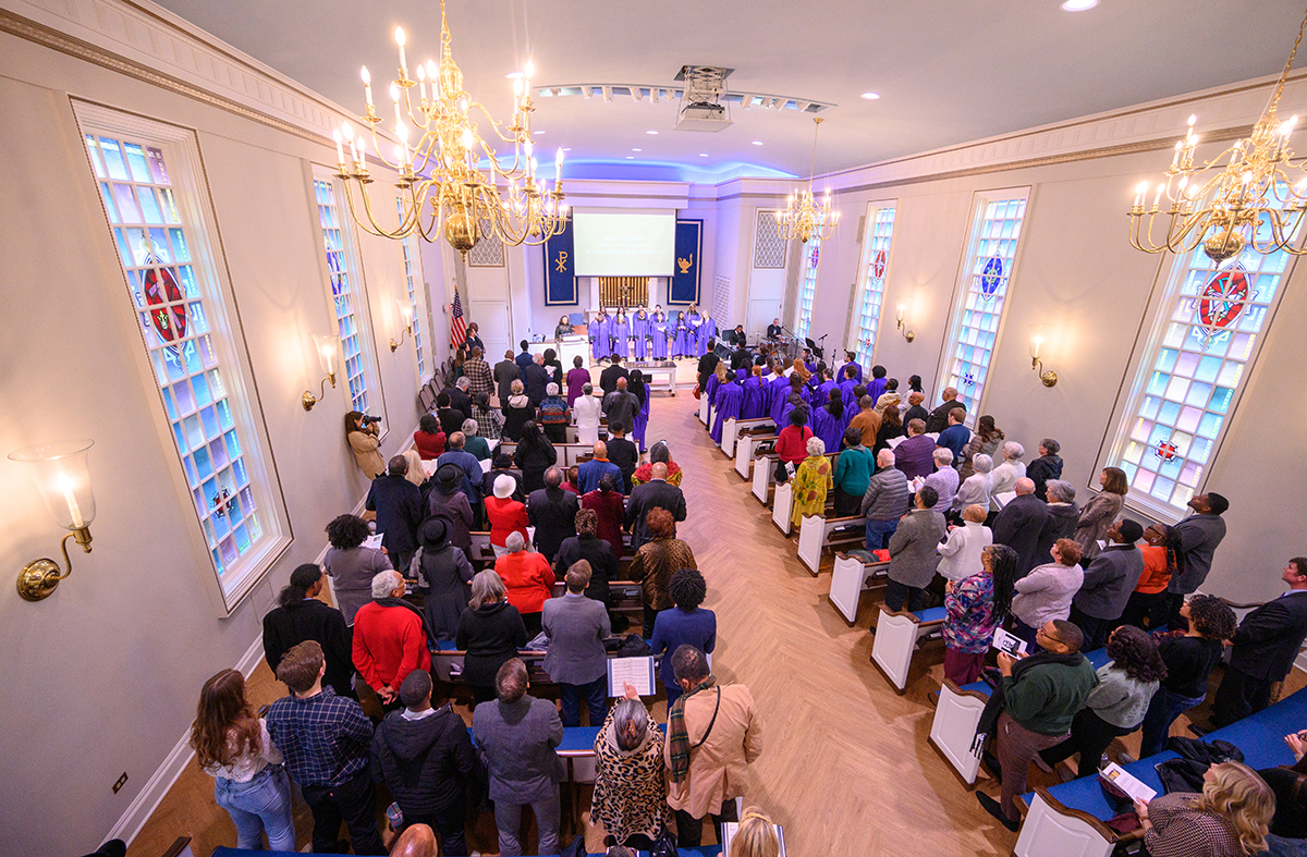 Audience members stood as they sang along with HPU’s Genesis Gospel Choir and Chapel Choir during the MLK Worship Service in Hayworth Chapel. 