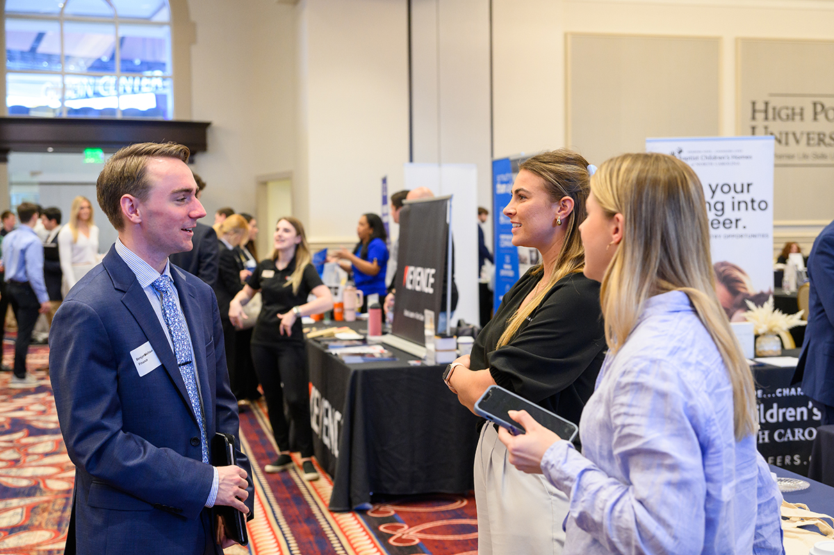 Ben Niehaus, a senior finance major and president of the HPU Student Government Association, talked with recruiters during the Career and Internship Expo.