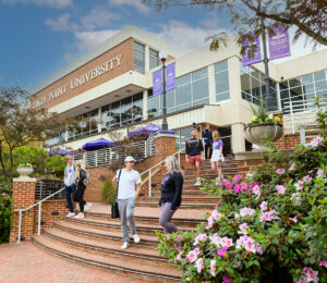 Students talked as they walked between classes behind the Slane Student Center.