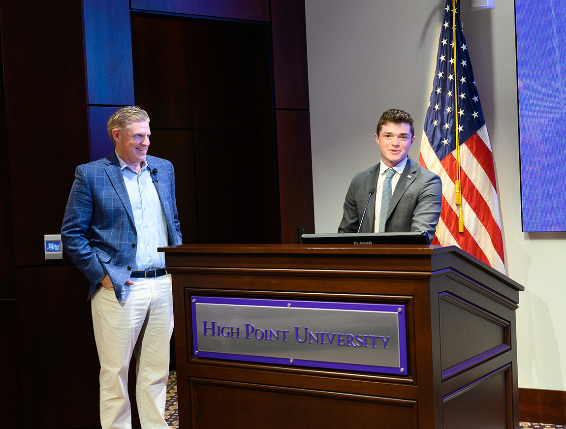 Charlie Freeman smiled as his son introduced him before the Life Skills and Leadership session. The younger Charlie Freeman also received an award as Outstanding Business Administration Student. 