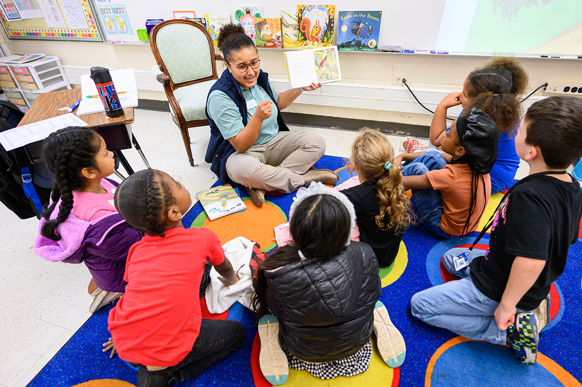 Natalie Denson, a freshman elementary education major from Columbus, Ohio, kept first-grade students engaged as she read to them.