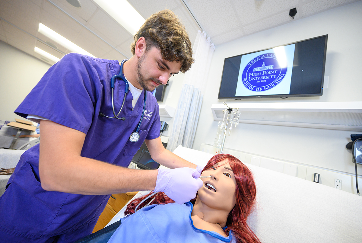 David Lombardi, who is pictured in an HPU nursing simulation lab, will start his nursing career in the Moses H. Cone Memorial Hospital Emergency Department in Greensboro, North Carolina.