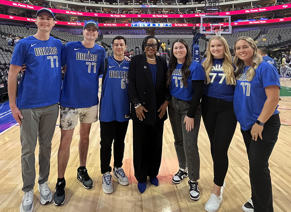 HPU students traveled to Dallas for an externship with Cynt Marshall, the former CEO of the NBA’s Dallas Mavericks and HPU’s Sports Executive in Residence, who is pictured at center with Annie Borovskiy, a sport management major who accepted a job as an inside sales representative with the NBA’s Brooklyn Nets before her graduation in 2024.