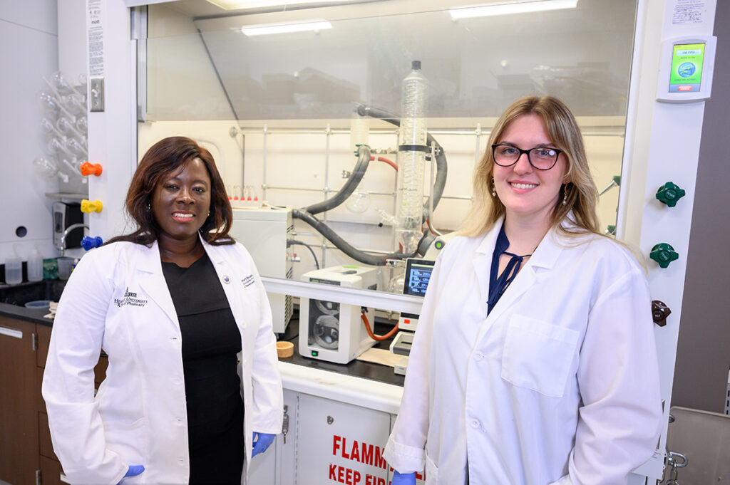 Dr. Comfort Boateng, an associate professor of pharmaceutical sciences, worked this summer in the drug discovery lab with Jane Rainwater, a rising first-year Doctor of Pharmacy candidate from Kernersville, North Carolina.