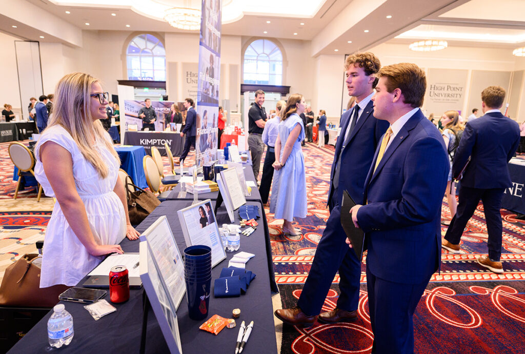 A Northwestern Mutual representative, left, met with freshmen Jack Krumpe, a business administration major, and Brooks Carpenter, a finance major from Hagerstown, Maryland.