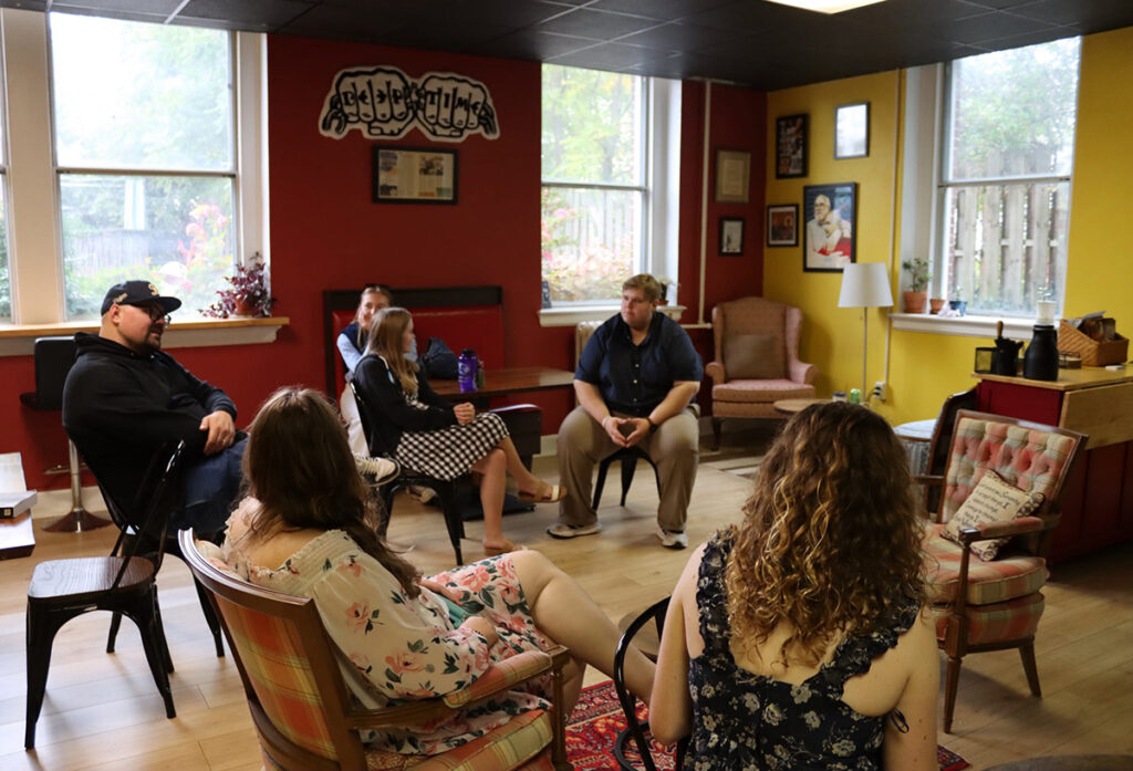 Students were pictured chatting as a group during their Fall Pilgrimage.