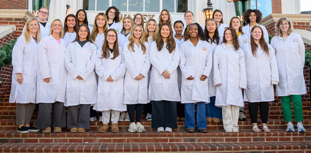 HPU students and faculty members who participated in SEA-PHAGES in the fall posed for a photograph outside the Wanek School of Natural Sciences.