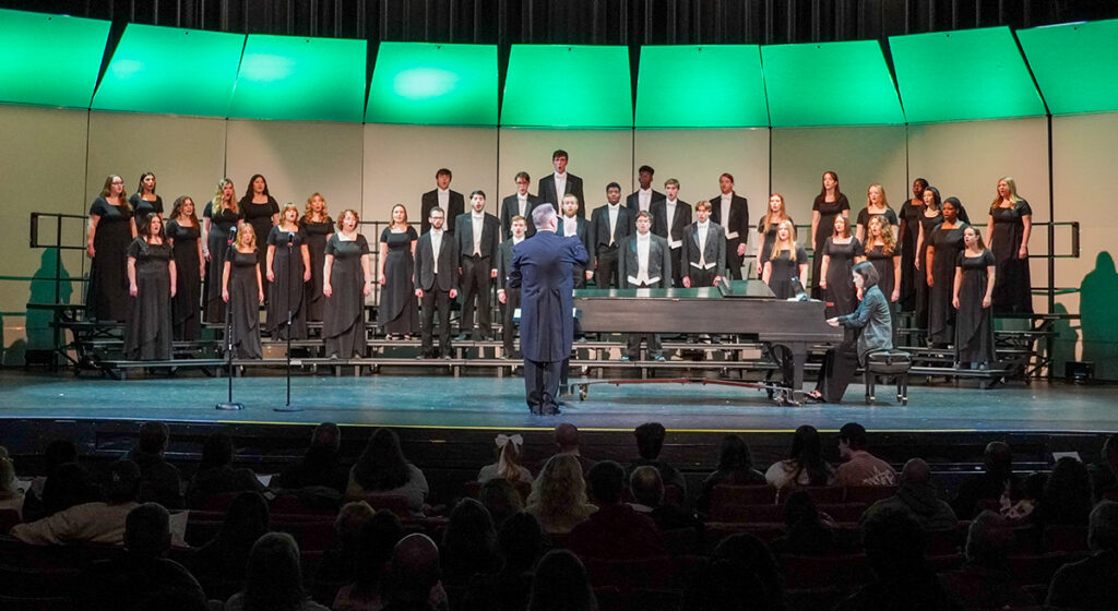 Dr. Marc Foster, chair of HPU’s Department of Music and director of choral activities, directed the choral concert at the Hayworth Fine Arts Center.