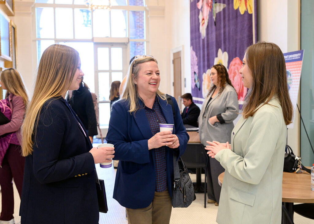 During the three Presidential Scholars Weekends, future HPU families had the opportunity to meet students, faculty and alumni and explore different majors and learning opportunities on campus. At right, Emerson Heckler, a 2024 HPU graduate and now a second-year medical school student, talked with Presidential Scholarship families in Butterfly Cafe.
