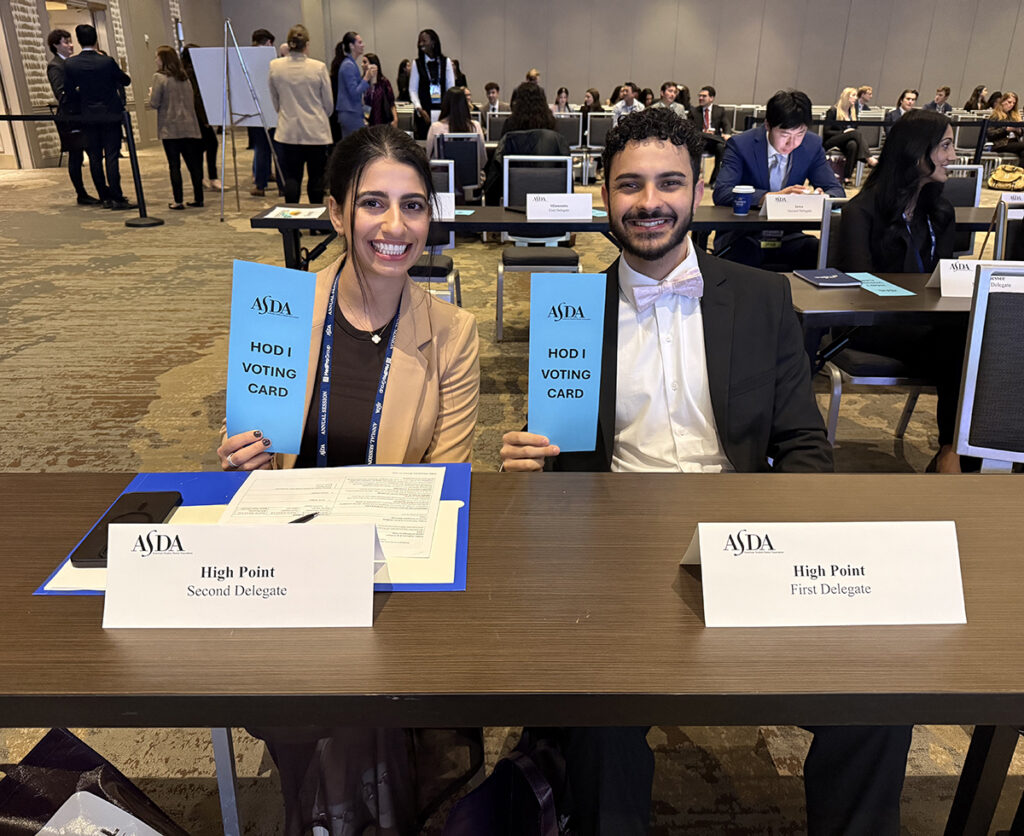 Bateh and Sadek were pictured with their voting cards at the ASDA annual session.