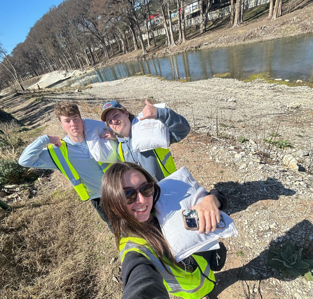 Students worked to fortify riverbanks to prevent flooding.