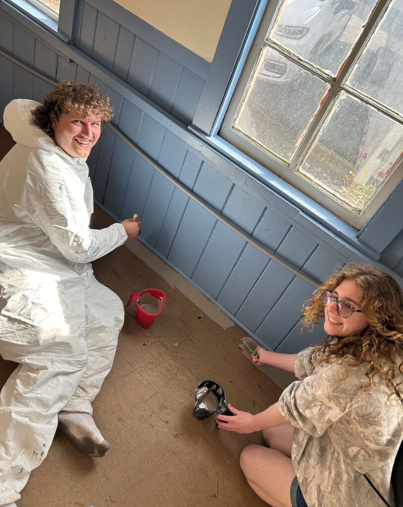 Students painted inside a San Antonio church during the spring pilgrimage.