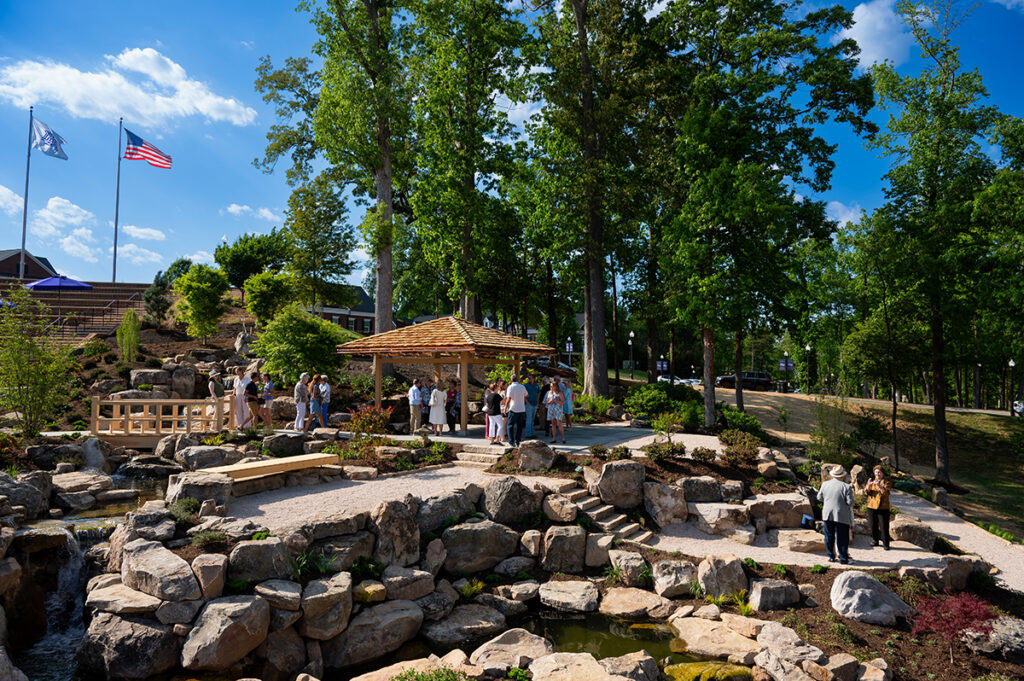 Students, staff, faculty and community members toured the new Cottrell Japanese Garden.