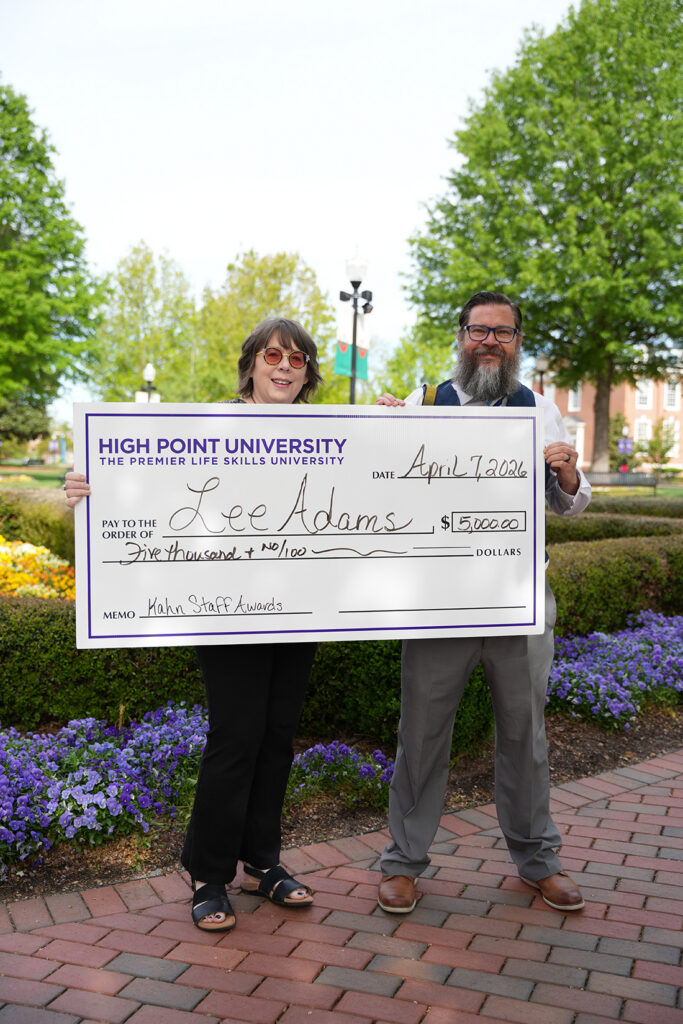 Gail Adams with her husband HPU Photographer Lee Adams after the Kahn staff awards were presented.