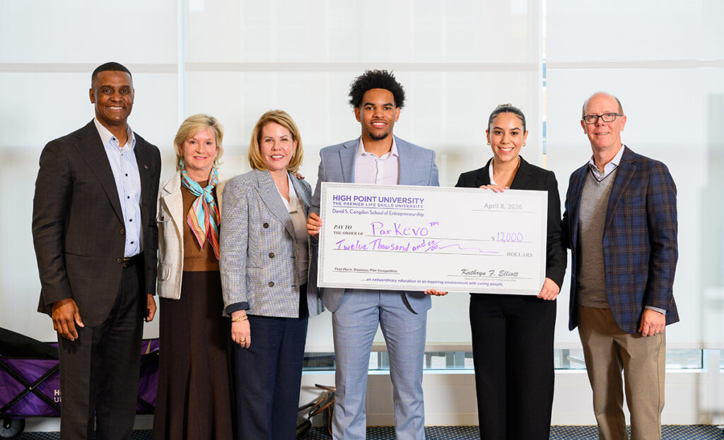High Point University students presented their business plans to a panel of judges and received a combined $30,000 in start-up funds at the 16th annual HPU Business Plan Competition on April 8. Pictured from left with their award checks were first-place winners Evan Taylor and Brianna Shinespring, third-place winner Eva Thorn, second-place winner Mason Wolford, fourth-place winning team Brett Sykes, Ashley Phelps and Connor Dearman, and fourth-place winner William Rossi.