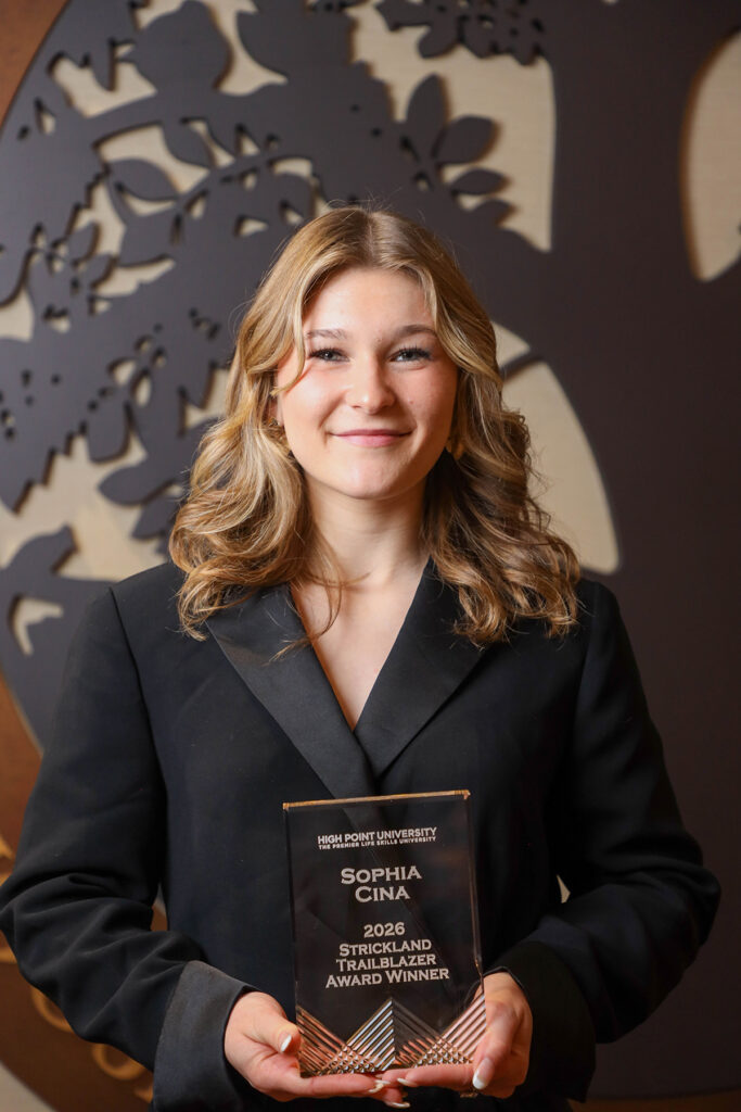 HPU presented Sophia Cina, a Class of 2025 alumna, with the sixth annual Elizabeth Miller Strickland Trailblazer Award during a March 16 dinner in the Anne Kerr Walker Ballroom.
