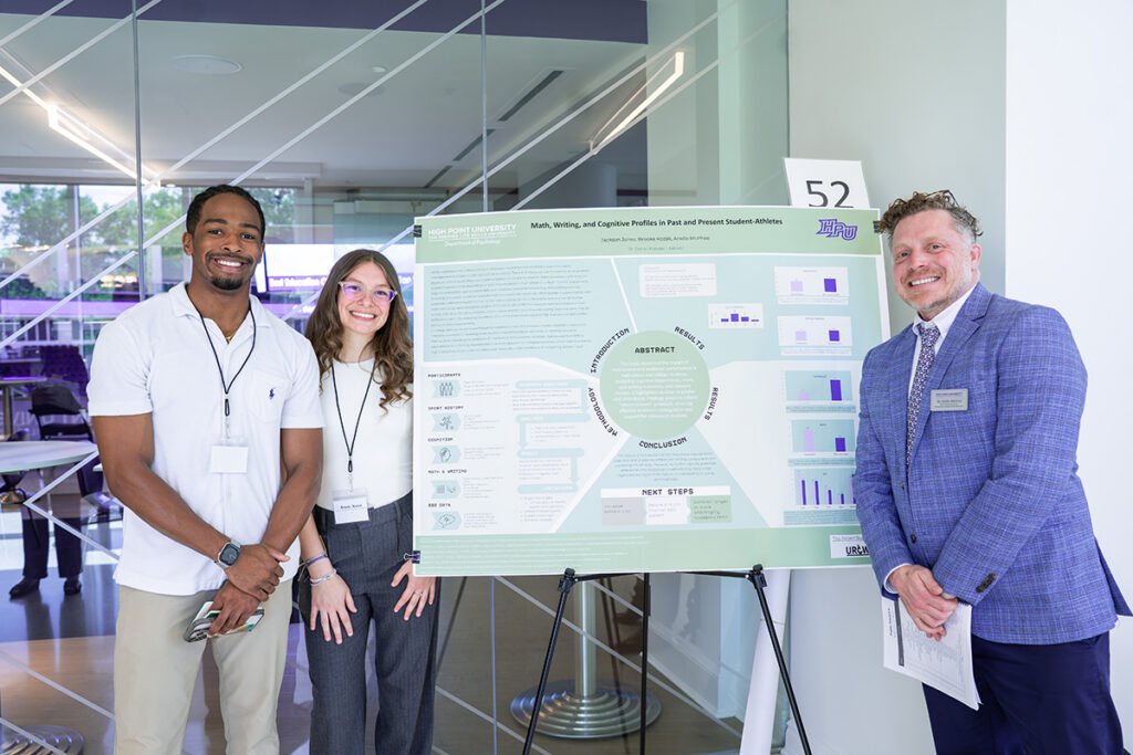 Jackson Jones and Brooke Kozak presented research on math and writing fluency skills in college students who have sports experience, which they conducted with Daniel Krenzer, assistant professor of psychology.