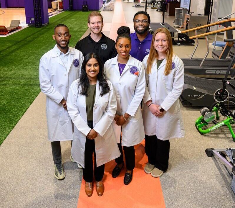 HPU student working with professor in lab
