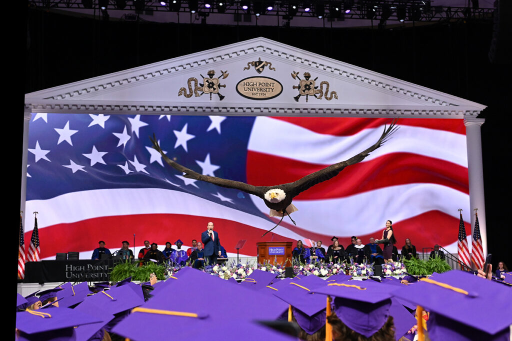 A bald eagle named Clark soared over the graduates at the end of the ceremony as Lee Greenwood, international country music icon and HPU’s Artist in Residence, performed “God Bless the USA.”