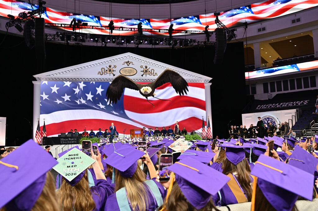 A bald eagle named Clark soared over the graduates at the end of the ceremony to symbolize the ideals of free enterprise, independence and the ability to pursue new opportunities in America.