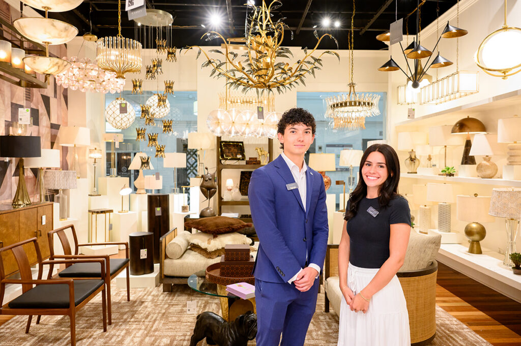 Tyler Jung, a junior business administration major, and Maddie Losacco, a senior psychology major, worked in the Currey and Company showroom.