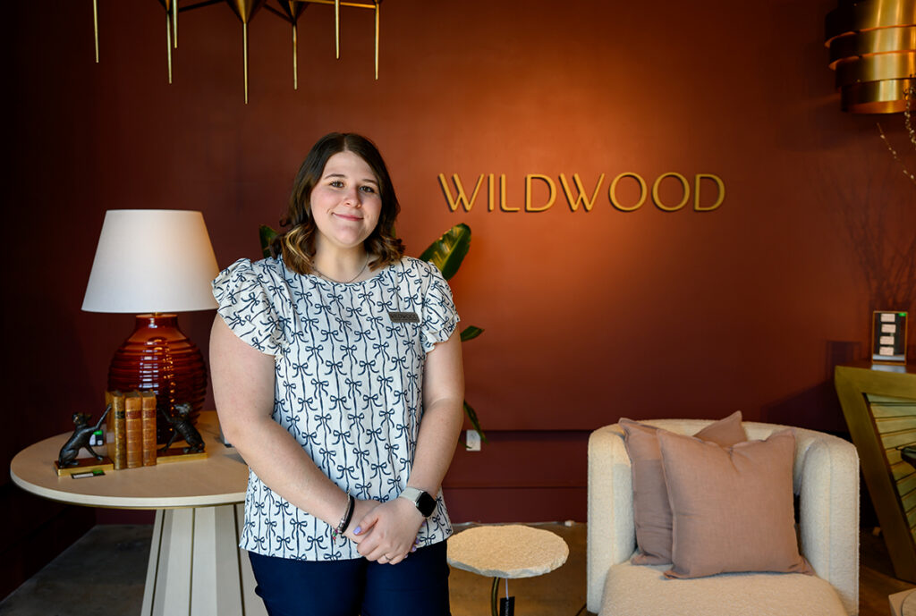 Kayleigh Lennon, a freshman interior design major, greeted customers, scanned their badges and connected them with their sales representatives at the Wildwood Home showroom.