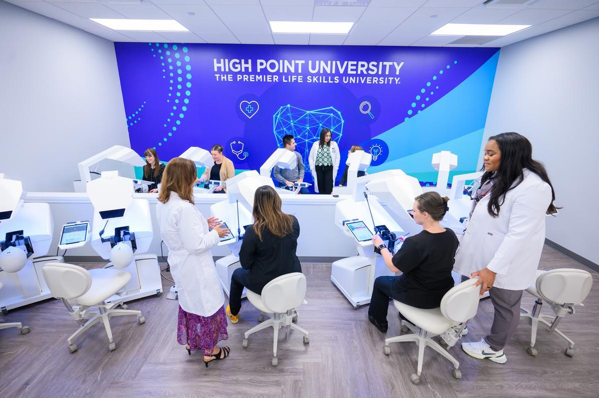 HPU student working with professor in lab