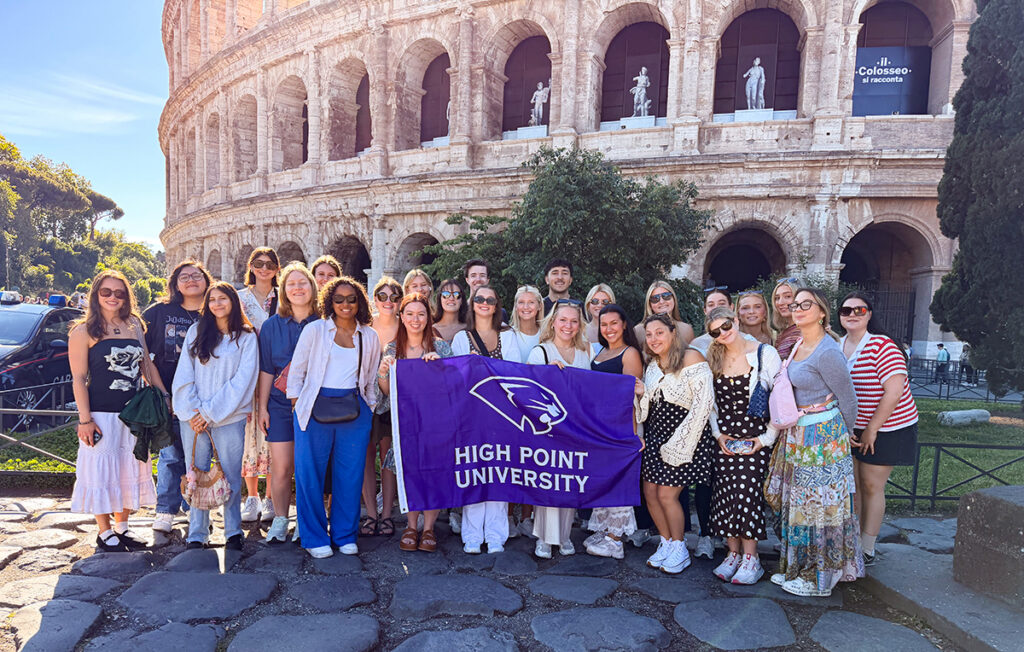 Students on the Grand Tour of Italy were pictured in front of the Colosseum in Rome.