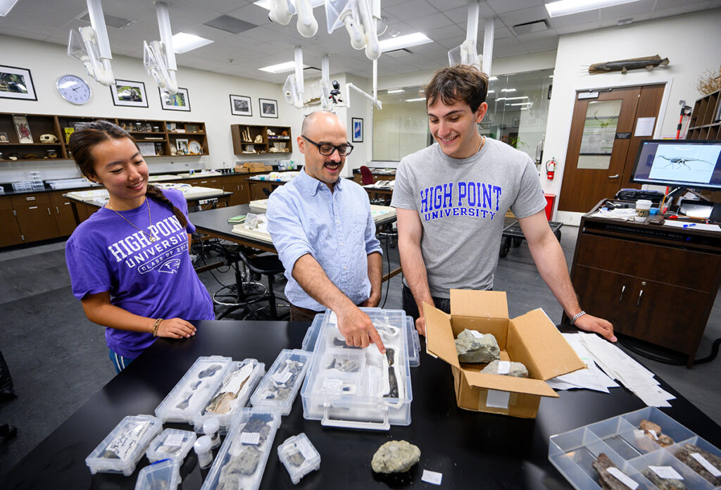 Eleanor Lee, a sophomore biology major, smiled as Stieglar and Allan discussed the fossils they found.