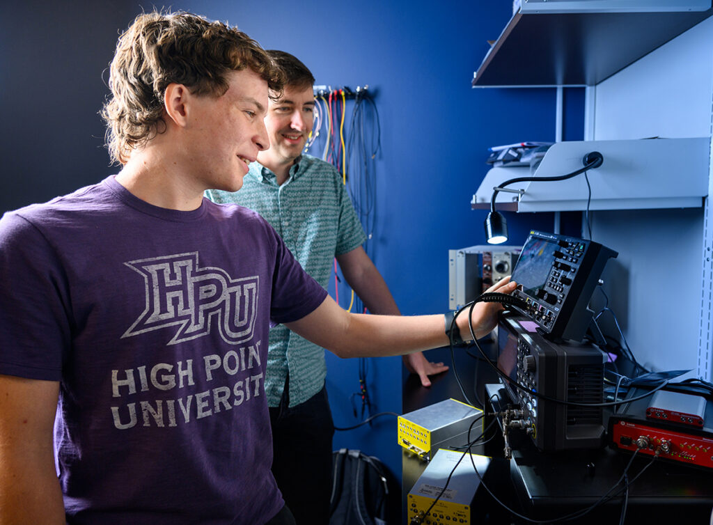 Paul Cusumano, a senior electrical engineering major, and Dr. Adam Anthony, assistant professor of physics and co-director of HPU’s Natural Science Fellows, analyzed electrical signals on an oscilloscope.
